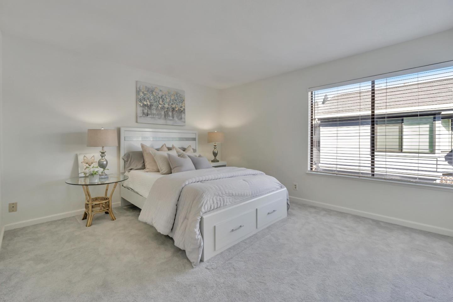 1677 Geary Road Walnut Creek, CA 94597 - Photo 18 of 38 a spacious bedroom with a bed and a window