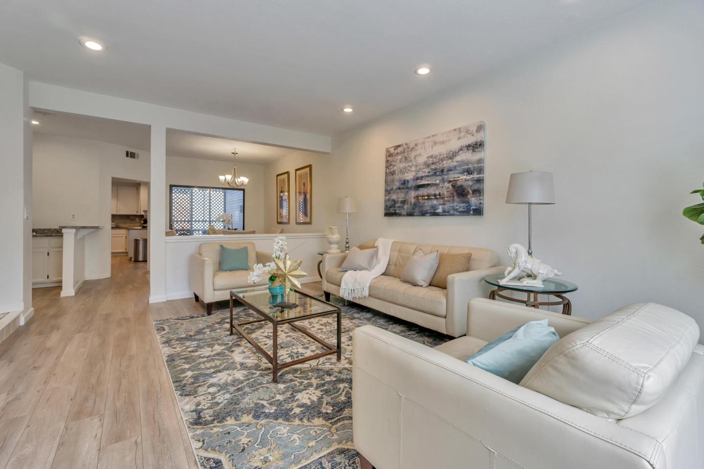1677 Geary Road Walnut Creek, CA 94597 - Photo 2 of 38 a living room with furniture and wooden floor