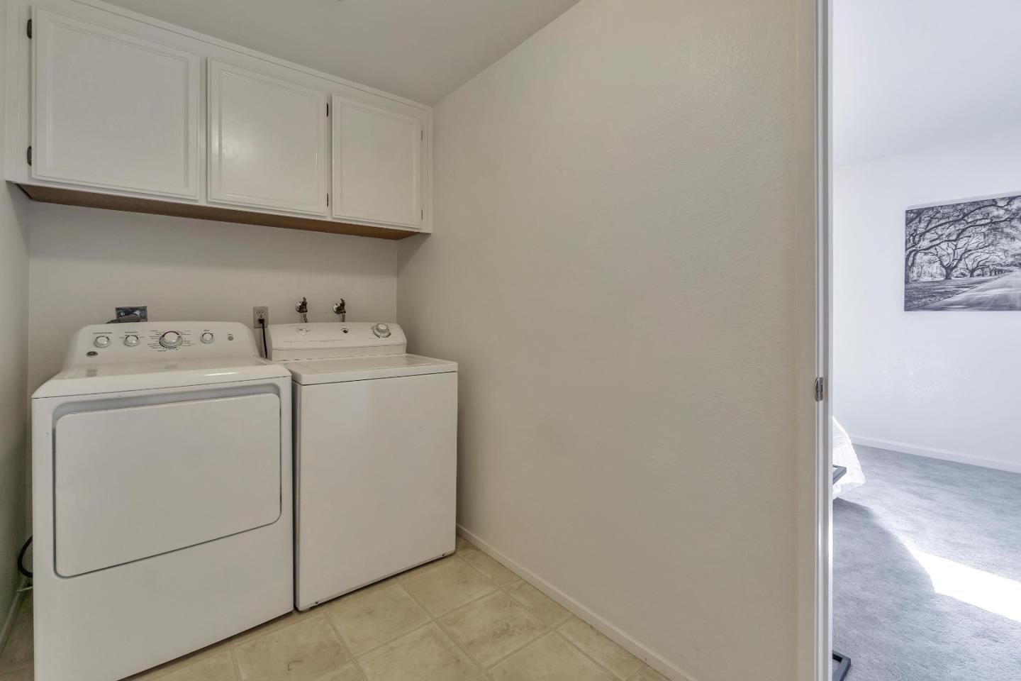 1677 Geary Road Walnut Creek, CA 94597 - Photo 30 of 38 a utility room with dryer and washer