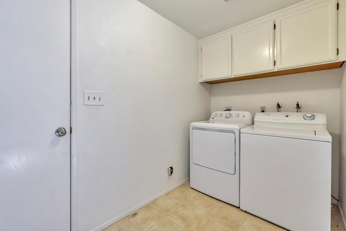1677 Geary Road Walnut Creek, CA 94597 - Photo 31 of 38 a utility room with dryer and washer