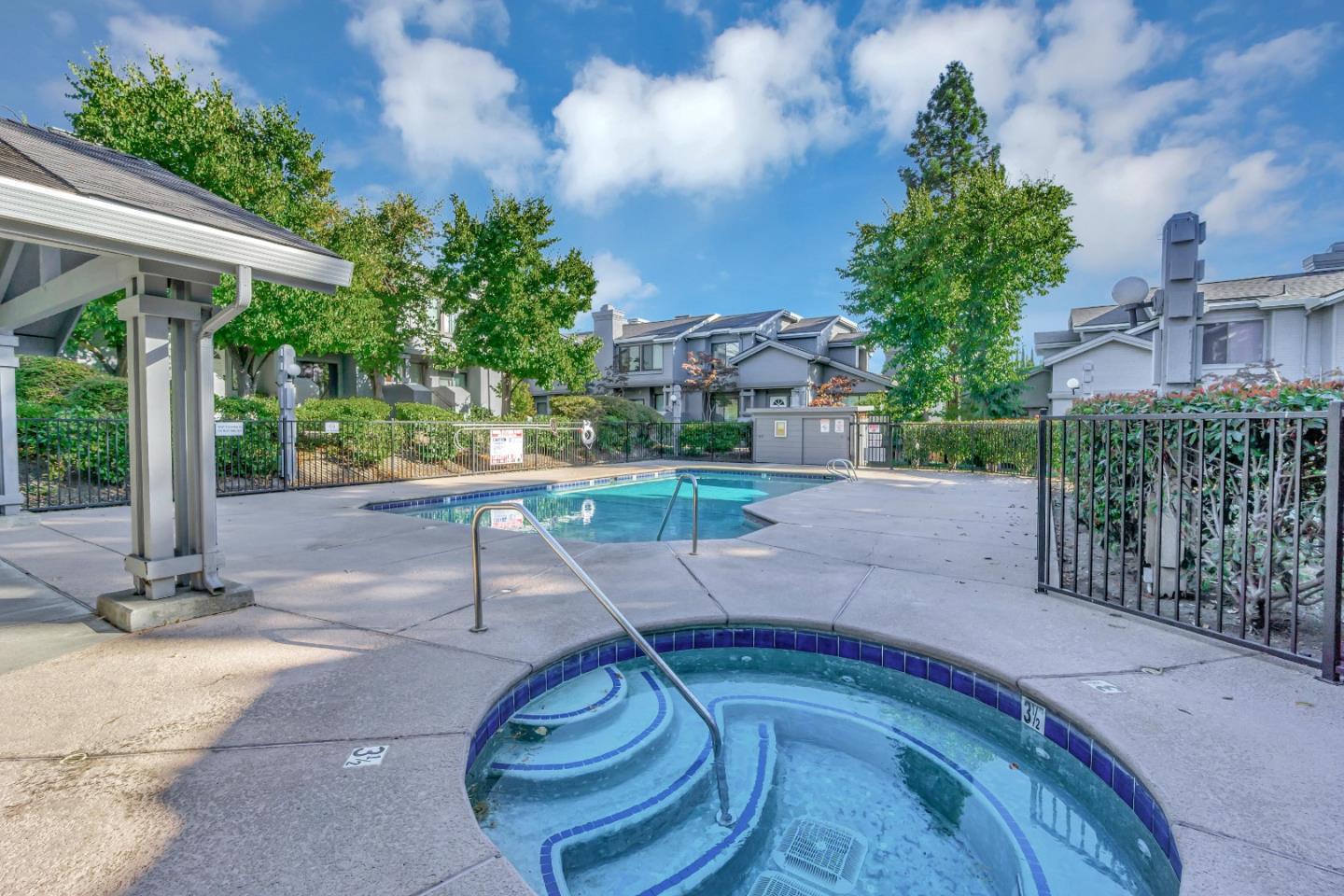 1677 Geary Road Walnut Creek, CA 94597 - Photo 38 of 38 a view of a patio with table and chairs potted plants