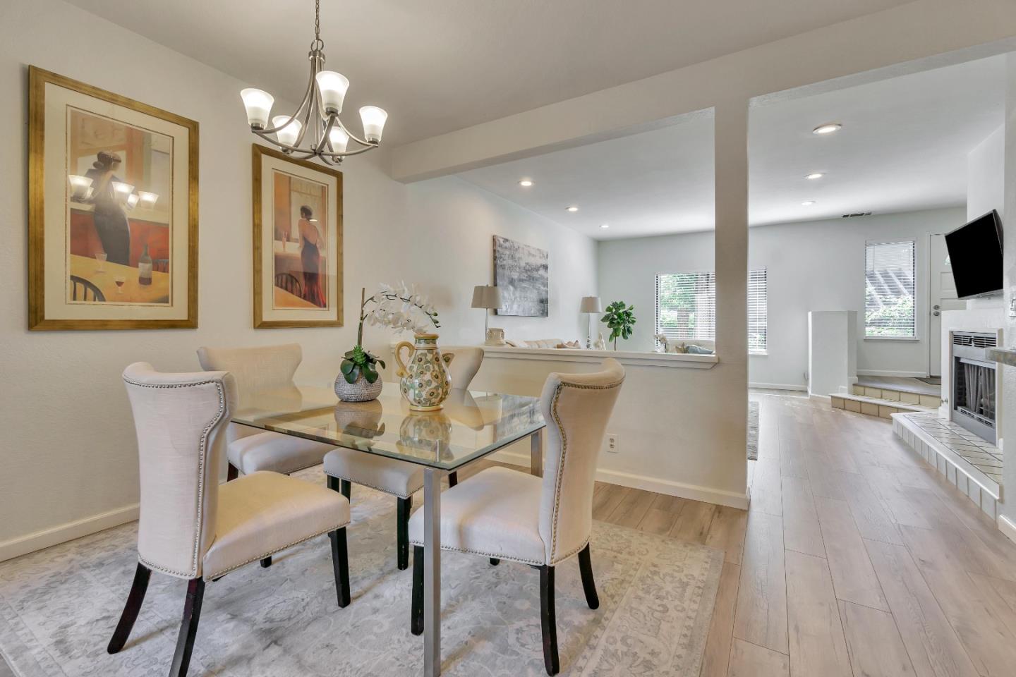 1677 Geary Road Walnut Creek, CA 94597 - Photo 8 of 38 a view of a dining room with furniture and wooden floor