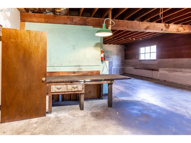 a view of dinning room with furniture and chandelier