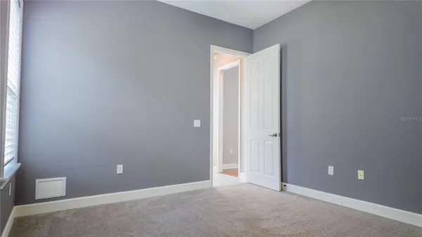a utility room with sink dryer and washer