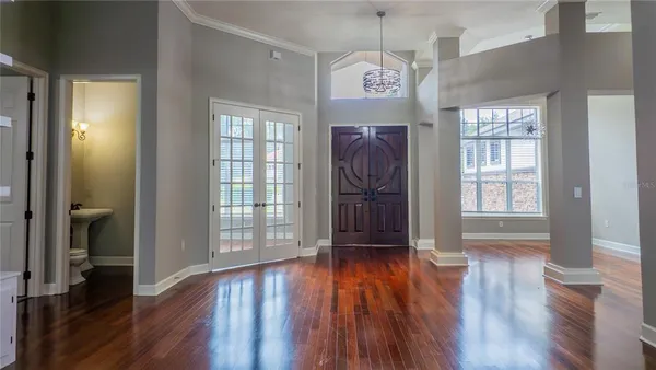 a view of entryway with wooden floor