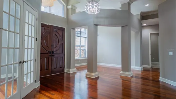 a view of entryway with wooden floor