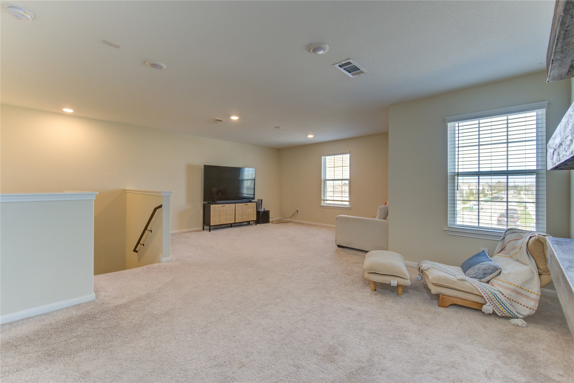 6706 Hobby Wind Ridge Drive Houston, TX 77075 - Photo 12 of 31 a living room with furniture and a flat screen tv