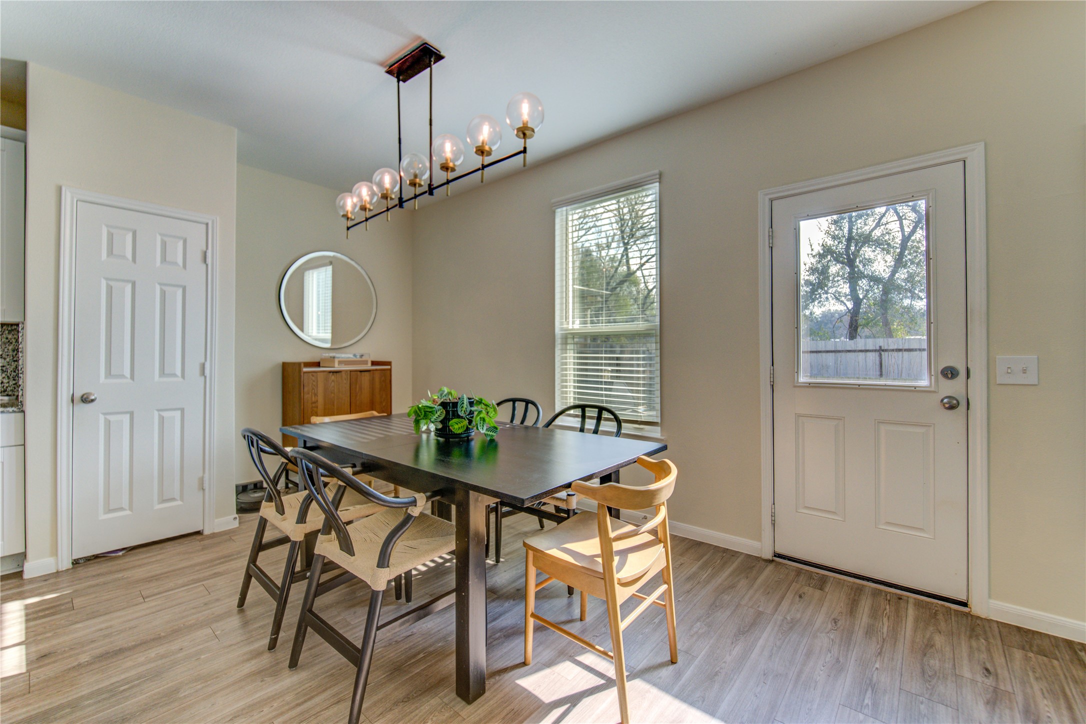 6706 Hobby Wind Ridge Drive Houston, TX 77075 - Photo 14 of 31 a view of a dining room with furniture window and wooden floor