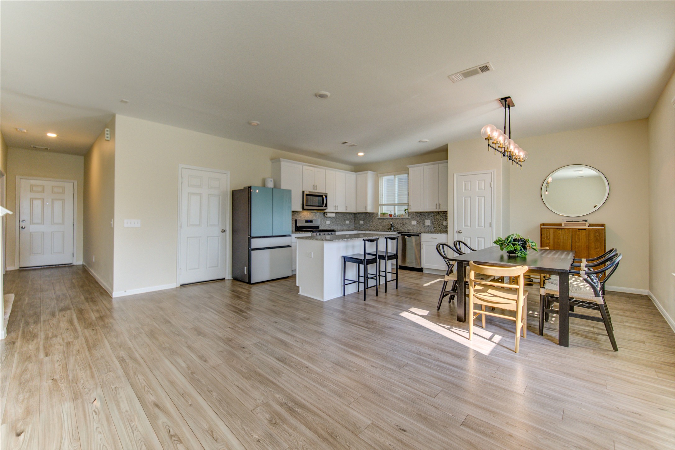 6706 Hobby Wind Ridge Drive Houston, TX 77075 - Photo 18 of 31 a view of kitchen with cabinets and wooden floor