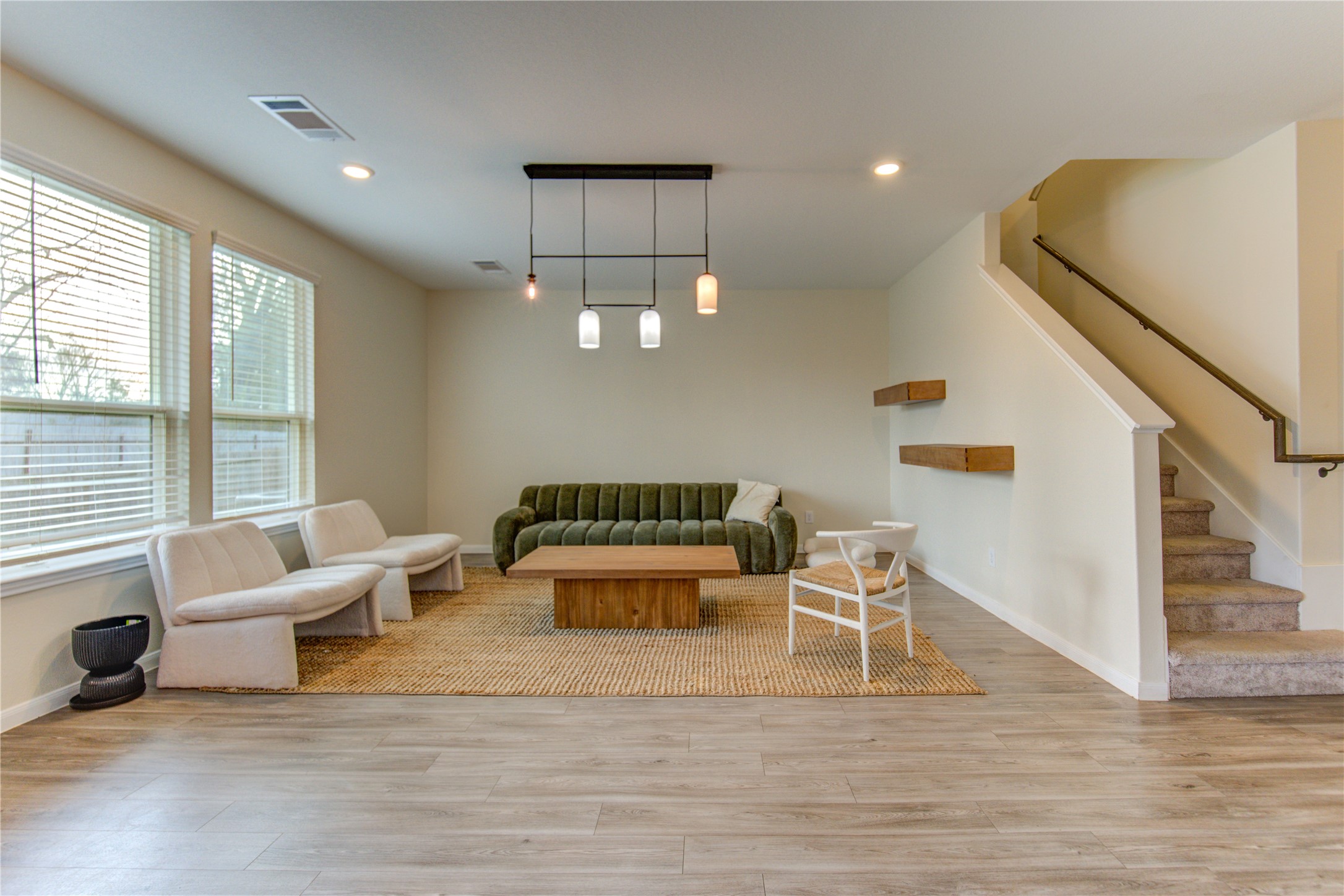 6706 Hobby Wind Ridge Drive Houston, TX 77075 - Photo 23 of 31 a living room with furniture and a wooden floor