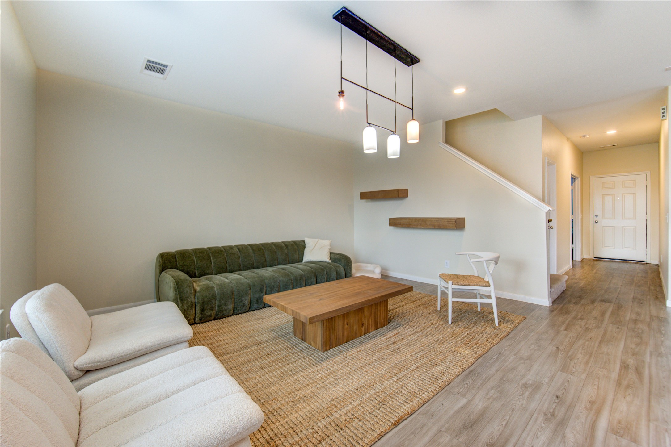 6706 Hobby Wind Ridge Drive Houston, TX 77075 - Photo 24 of 31 a living room with furniture and wooden floor