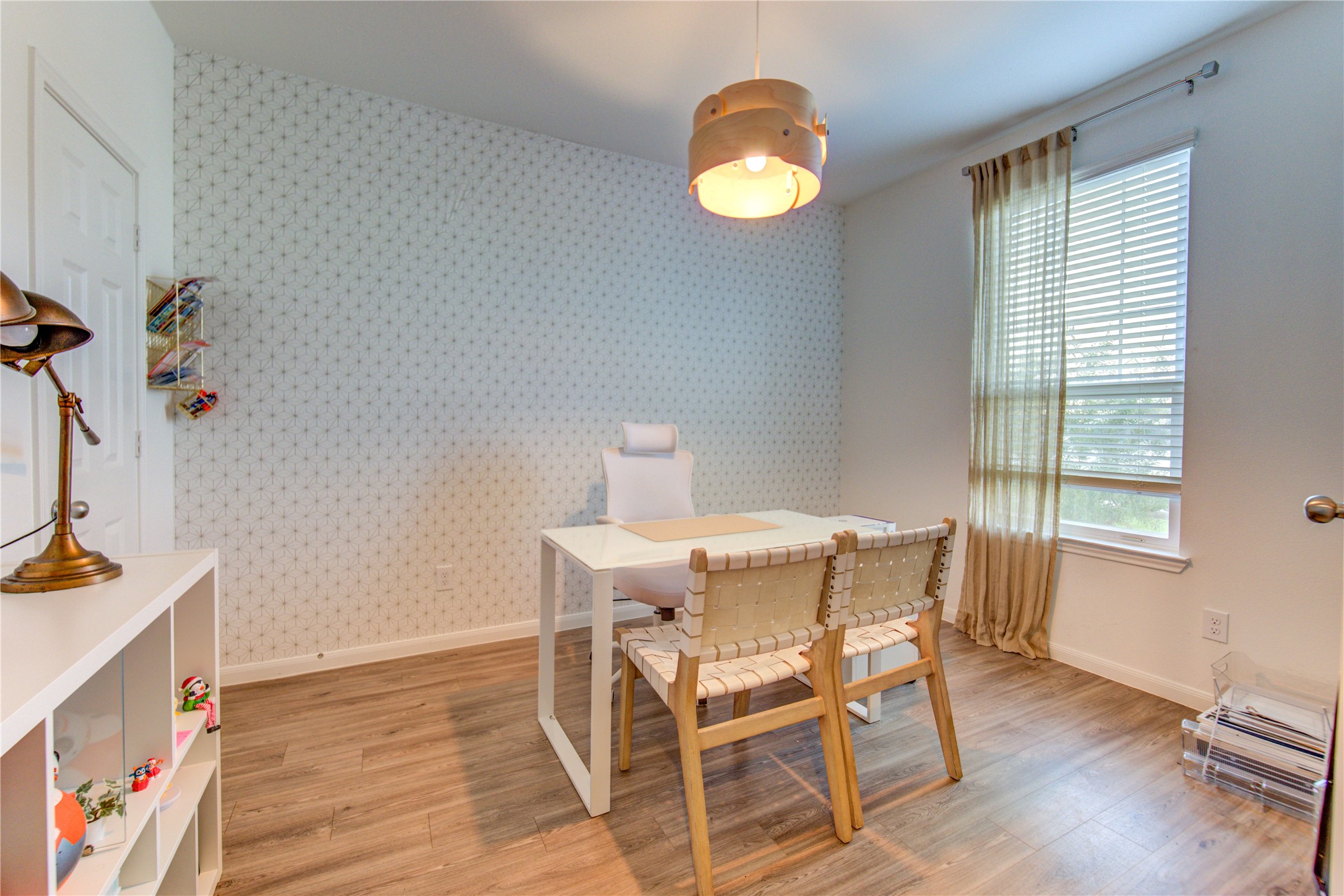 6706 Hobby Wind Ridge Drive Houston, TX 77075 - Photo 27 of 31 a view of a dining room with furniture and wooden floor