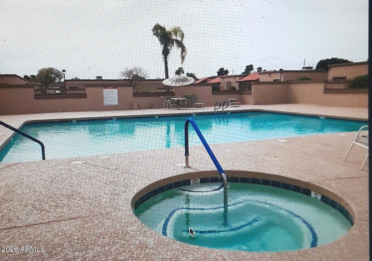 99 North Cooper Road, Unit 138 Chandler, AZ 85225 - Photo 11 of 13 Community pool and spa