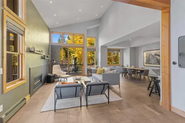a view of balcony with wooden floor and outdoor seating