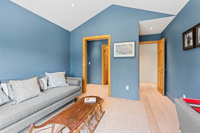 a bedroom with a bed and couch