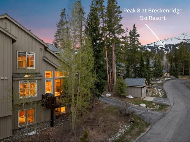 a view of a outdoor space with a patio and fire pit