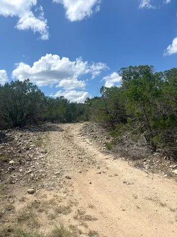 a view of a lake with mountains in the background