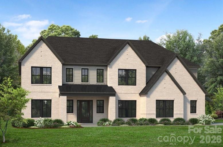 1003 Cox Road, Unit 16 Weddington, NC 28104 - Photo 1 of 1 a view of a yard in front view of a house