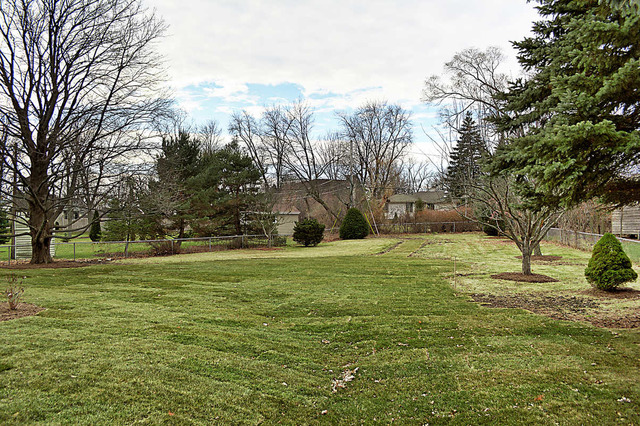 1909 Walnut Circle Northbrook, IL 60062 - Photo 2 of 3 a view of a house with a yard