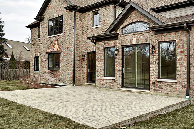 1909 Walnut Circle Northbrook, IL 60062 - Photo 3 of 3 a view of a white house with large windows