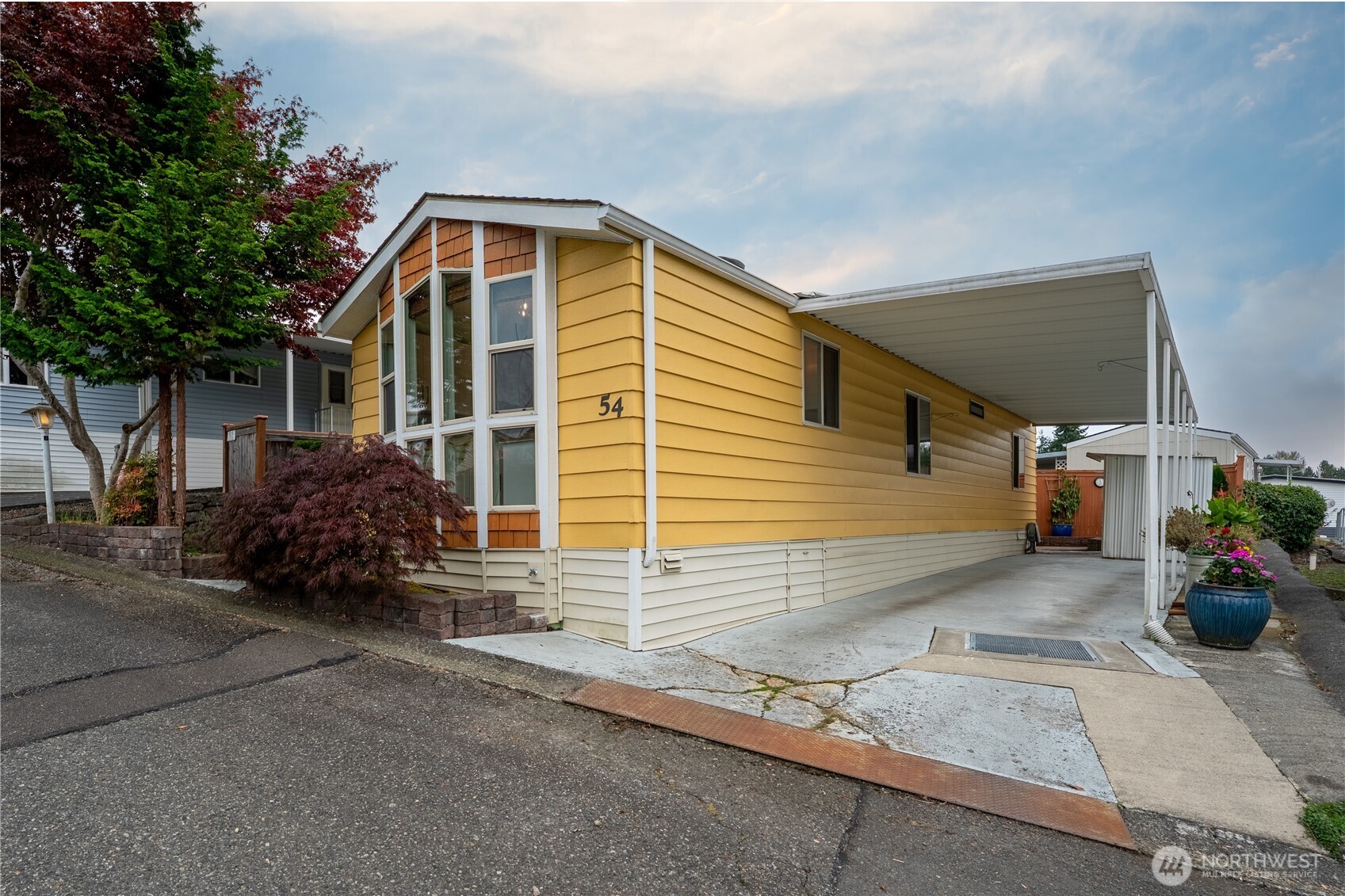 1415 84th Street Southeast, Unit 54 Everett, WA 98208 - Photo 13 of 19 a view of a house with a patio