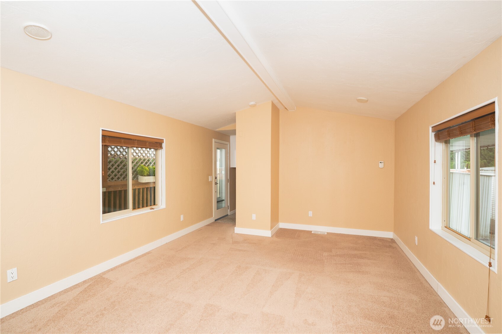1415 84th Street Southeast, Unit 54 Everett, WA 98208 - Photo 5 of 19 a view of an empty room with a window