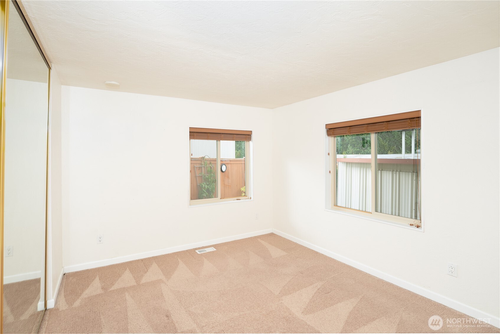 1415 84th Street Southeast, Unit 54 Everett, WA 98208 - Photo 6 of 19 an empty room with windows