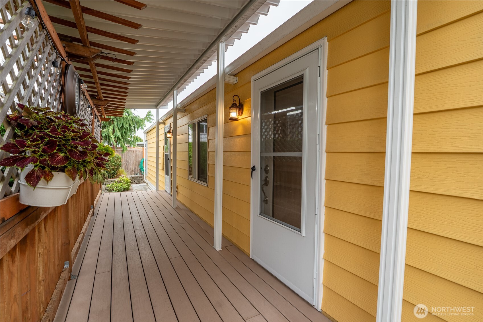 1415 84th Street Southeast, Unit 54 Everett, WA 98208 - Photo 9 of 19 a view of outdoor space with wooden floor and city view