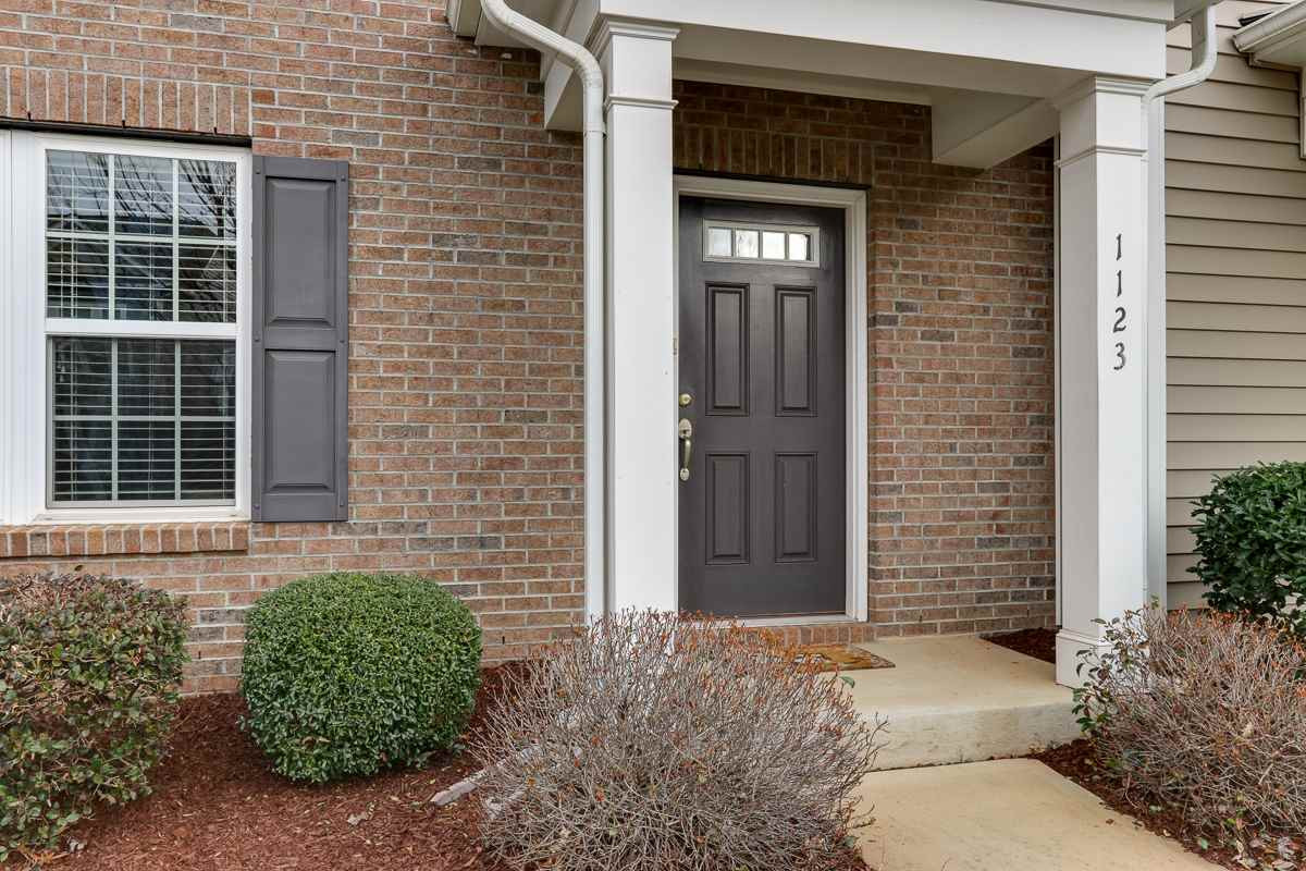 1123 Ileagnes Road Raleigh, NC 27603 - Photo 3 of 19 a couple of potted plants in front of door
