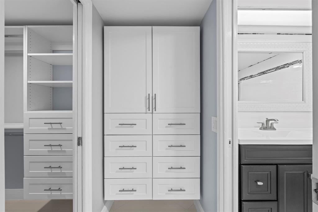 3090 North Course Drive, Unit 309 Pompano Beach, FL 33069 - Photo 13 of 21 a view of walk in closet