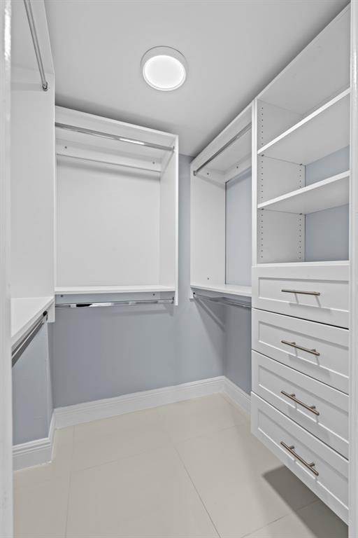 3090 North Course Drive, Unit 309 Pompano Beach, FL 33069 - Photo 14 of 21 a view of an empty walk in closet