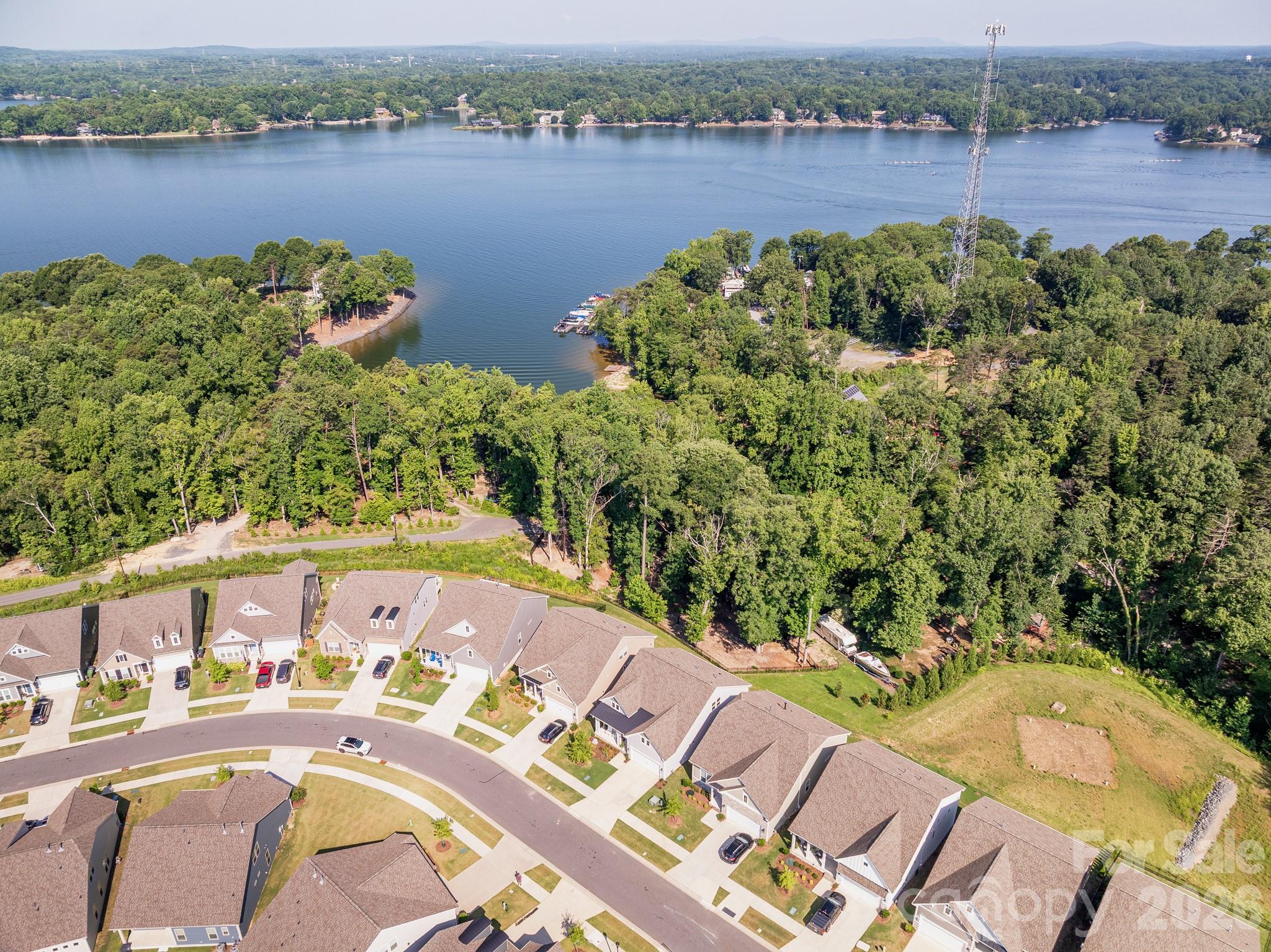 17210 Sand Bank Road Charlotte, NC 28278 - Photo 20 of 20 an aerial view of a house with a lake view