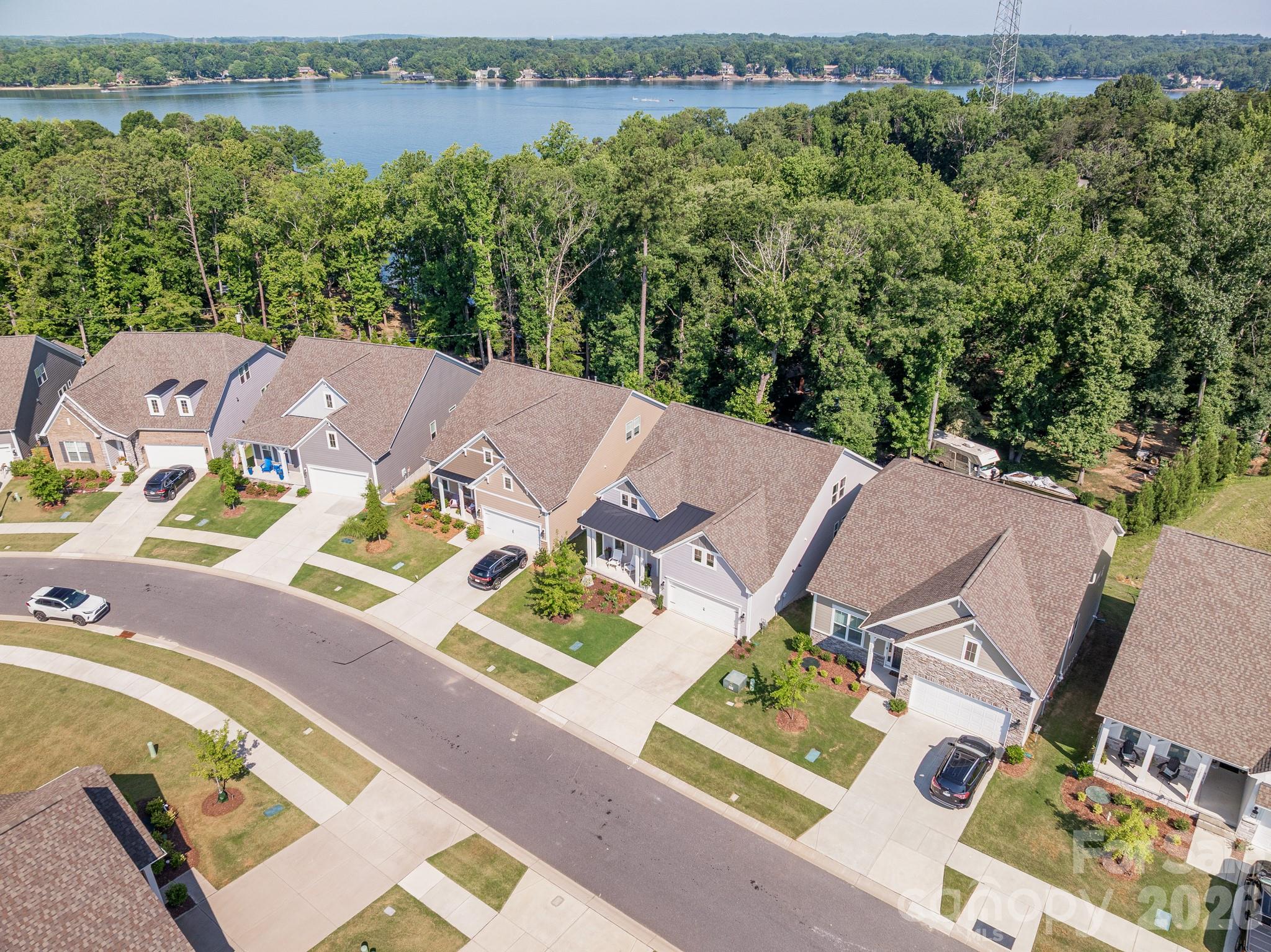 17210 Sand Bank Road Charlotte, NC 28278 - Photo 2 of 20 an aerial view of a house with garden space and lake view