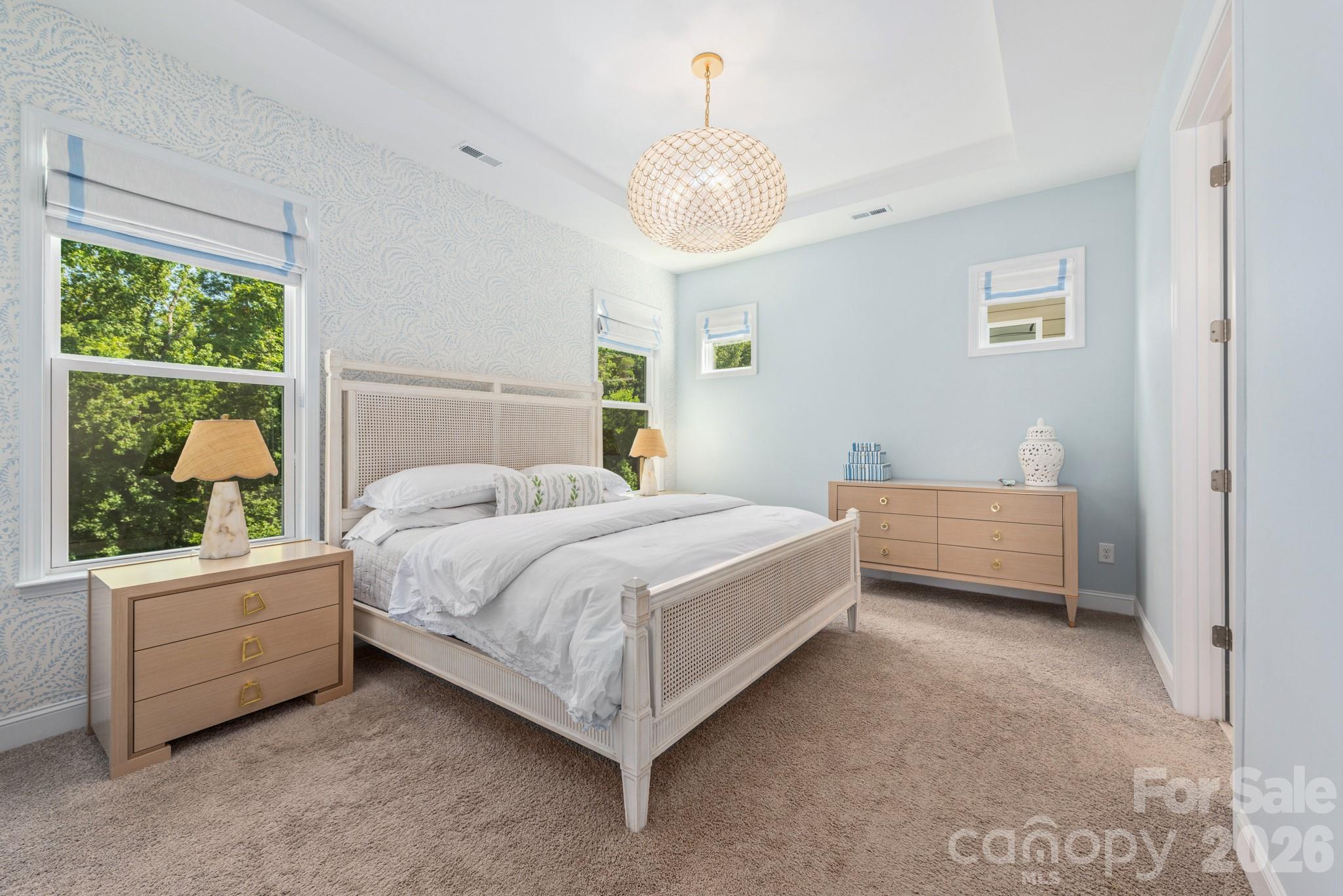 17210 Sand Bank Road Charlotte, NC 28278 - Photo 8 of 20 a bedroom with a bed and a large window