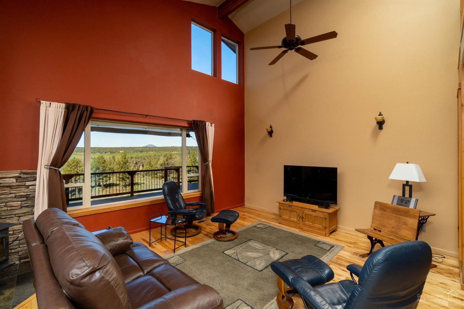 14166 Southwest Ridge Place Terrebonne, OR 97760 - Photo 6 of 25 Living Room with ceiling fan and large p