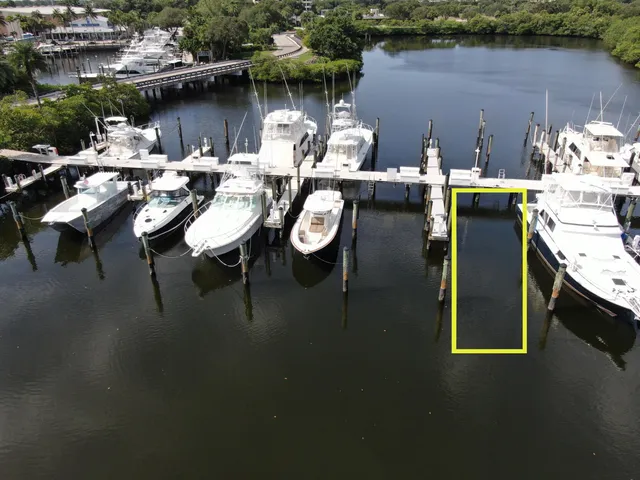 a view of a patio with table and chairs