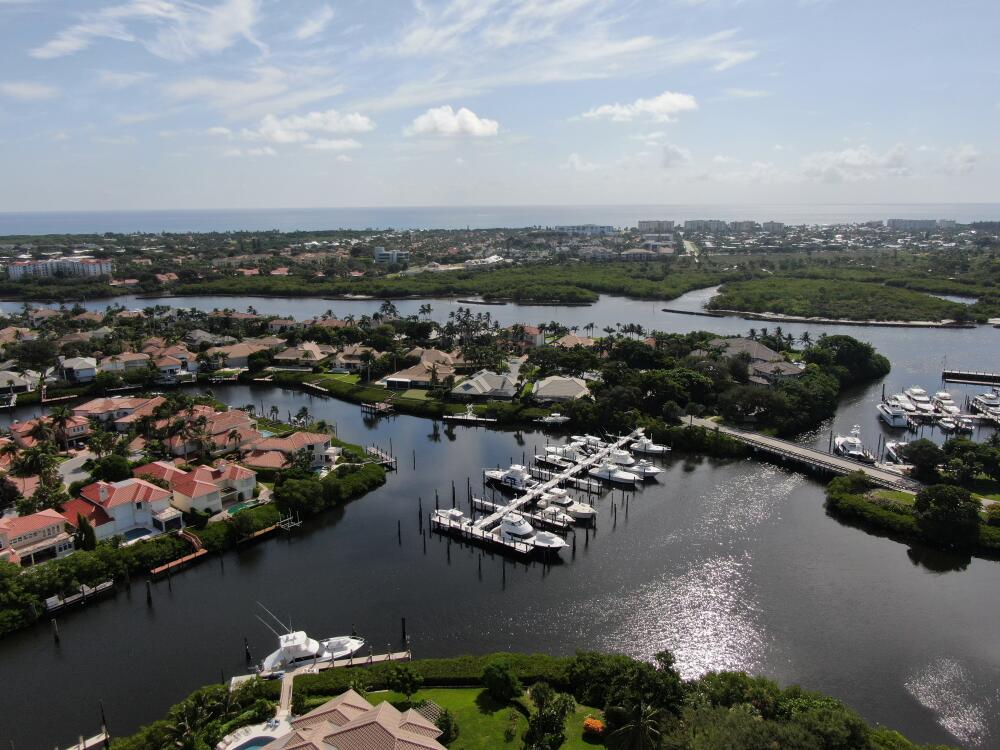 3232 Casseekey Island Road, Unit 7N Jupiter, FL 33477 - Photo 4 of 8 an aerial view of a city with lake view
