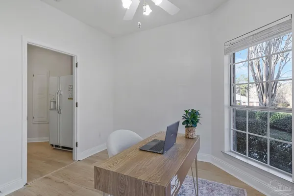 a view of a swimming pool with a patio