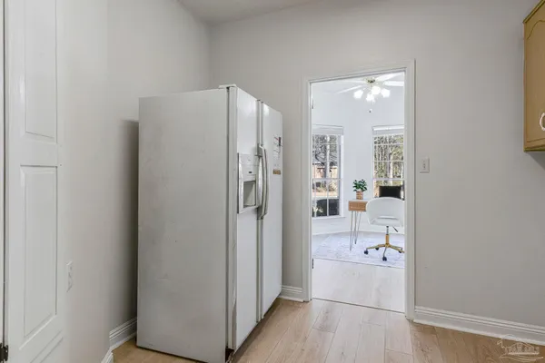 a view of a house with a snow on the road