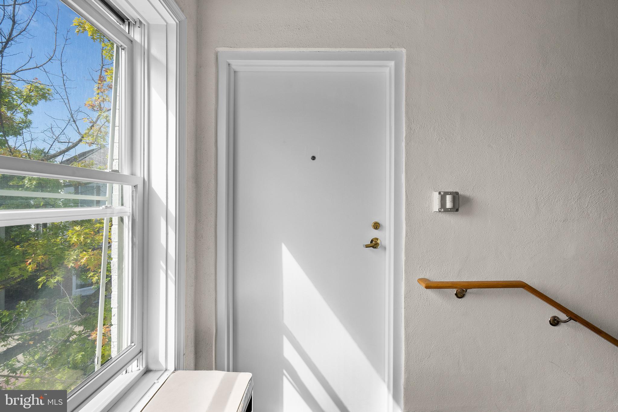 402 Main Street, Unit 300 Gaithersburg, MD 20878 - Photo 2 of 30 a bathroom with a tub and a window