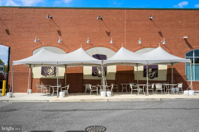 a front view of a house with a porch
