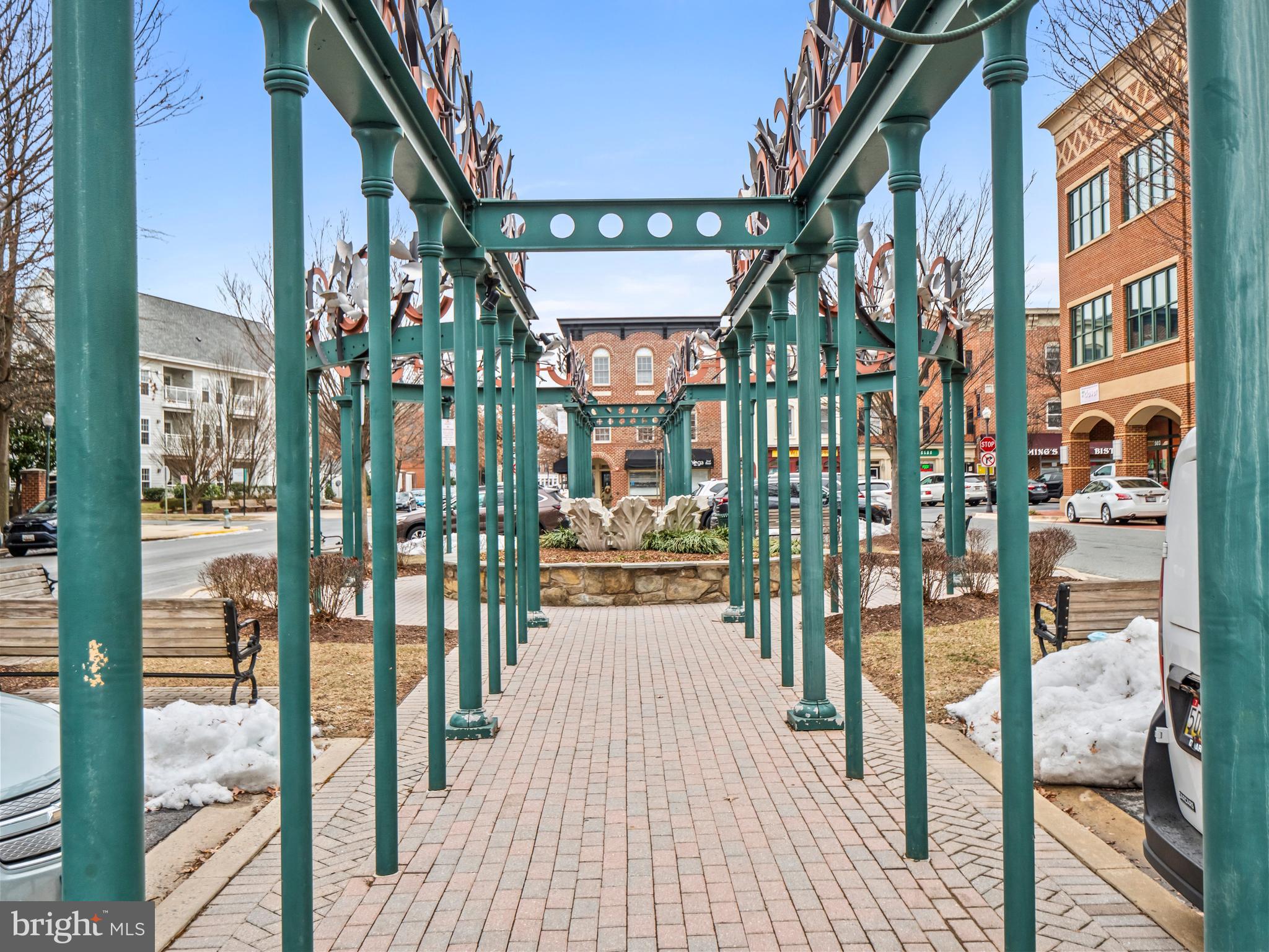 402 Main Street, Unit 300 Gaithersburg, MD 20878 - Photo 23 of 30 a view of a house with a porch