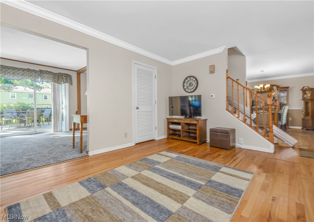 446 Stratford Road Akron, OH 44333 - Photo 8 of 29 Living room with crown molding and hardwood floors