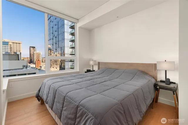 a bedroom with a bed and a cabinets