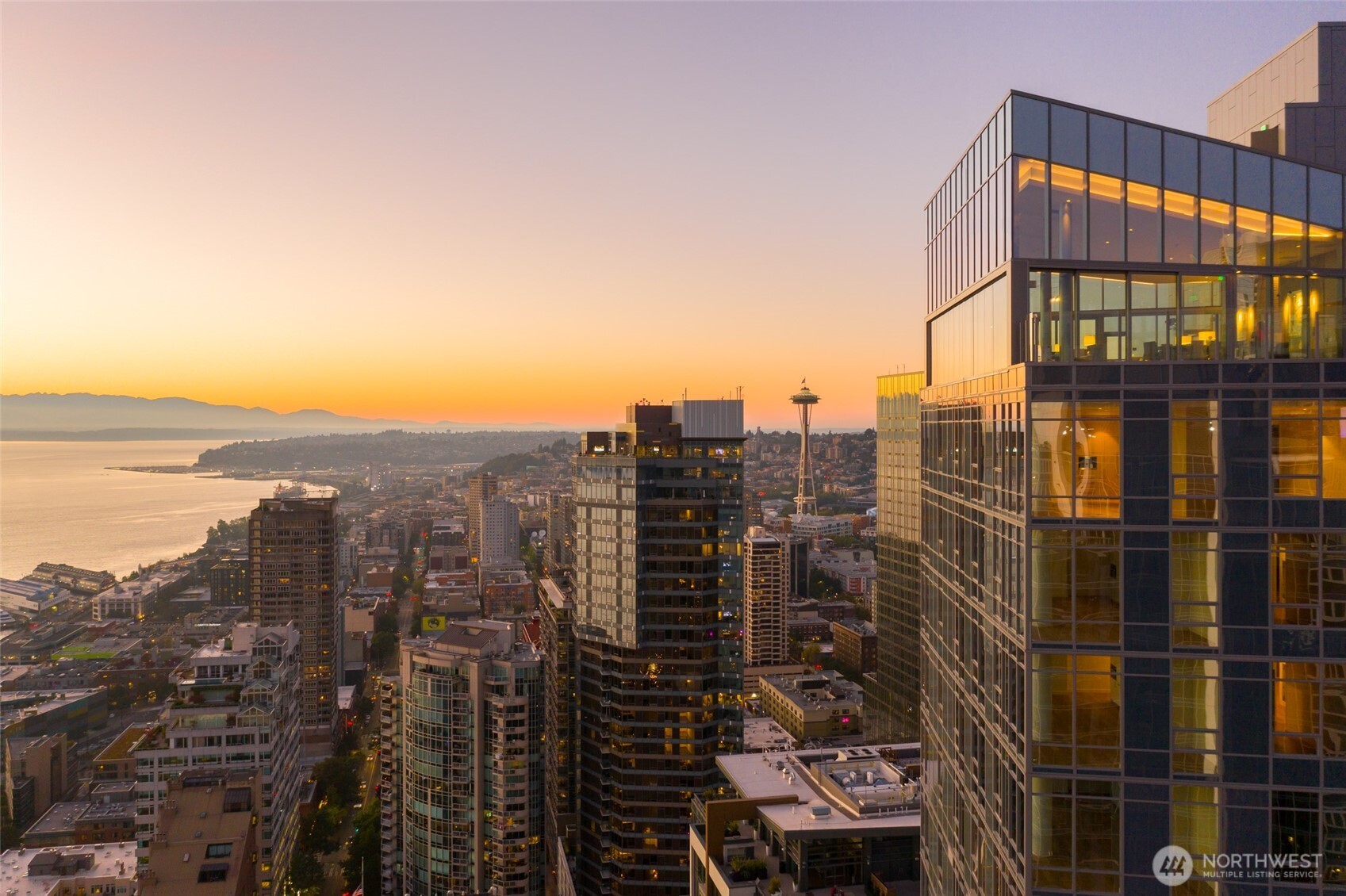 121 Stewart Street, Unit 1701 Seattle, WA 98101 - Photo 20 of 32 a view of a city with tall buildings
