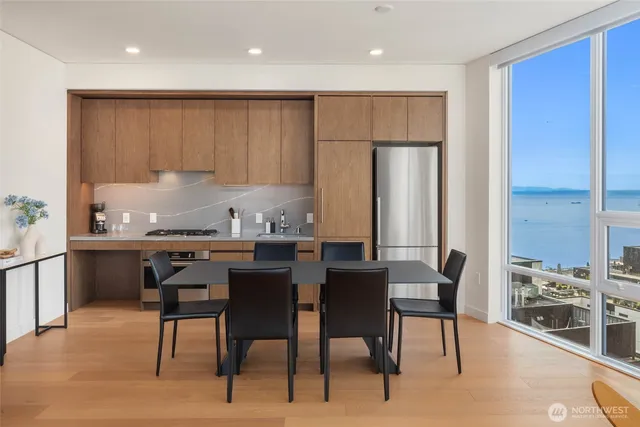 a kitchen with a table and chairs in it