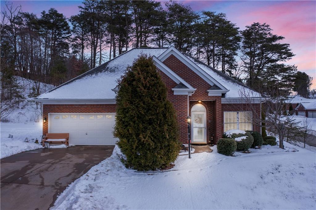 100 Patton Drive Aliquippa, PA 15001 - Photo 1 of 25 a view of a house with brick walls and potted plants