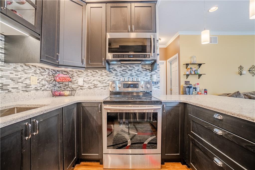 100 Patton Drive Aliquippa, PA 15001 - Photo 18 of 25 a kitchen with a sink stove and microwave