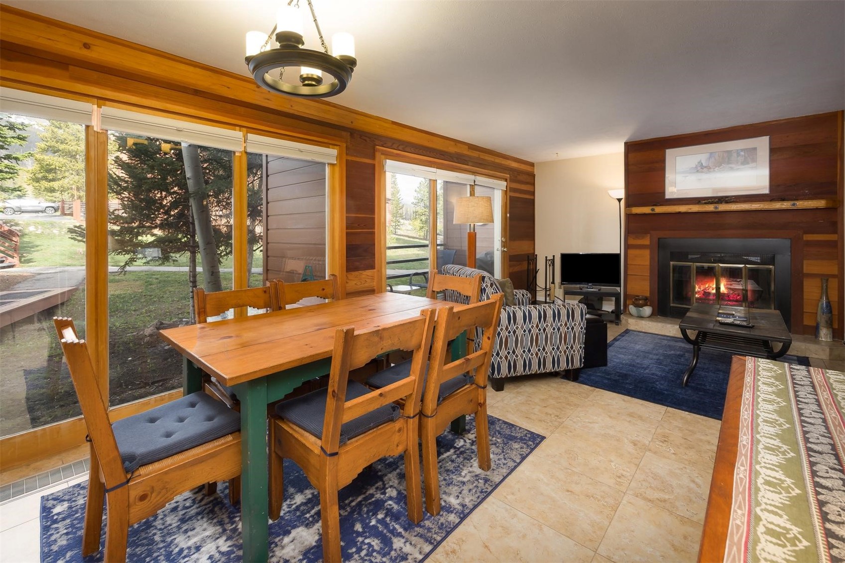 91100 Ryan Gulch Road, Unit 91105 Silverthorne, CO 80498 - Photo 2 of 49 a view of a livingroom with furniture window and outside view
