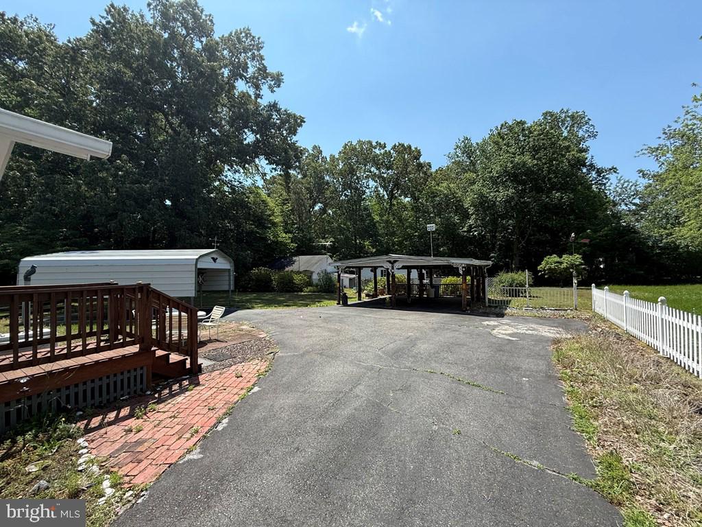 664 Sandy Point Road Heathsville, VA 22473 - Photo 3 of 12 Spacious outdoor retreat with greenery.